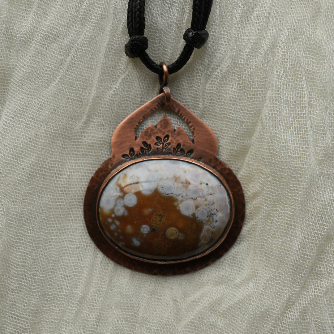 unique orange ocean jasper pendant necklace made with copper