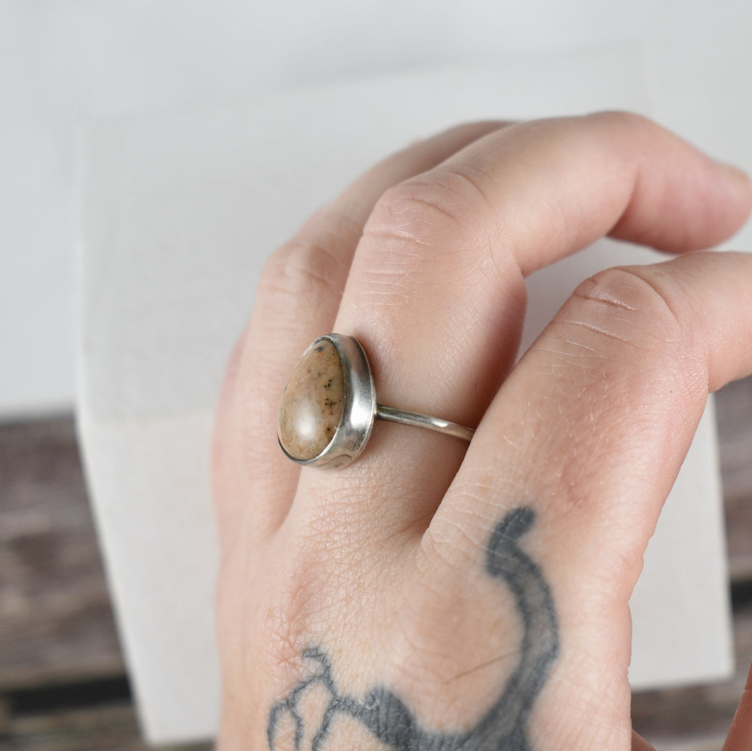 Orange stone and silver ring