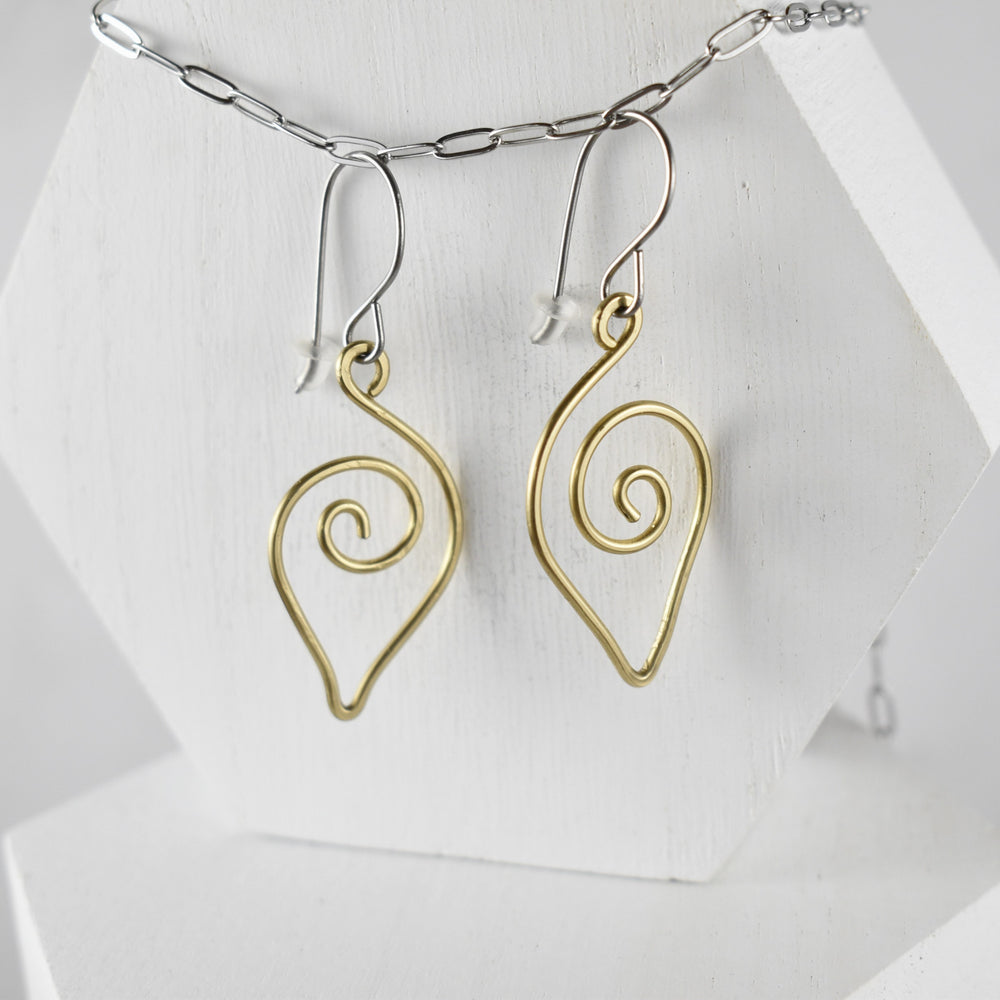 Hypoallergenic swirly Brass earrings for women