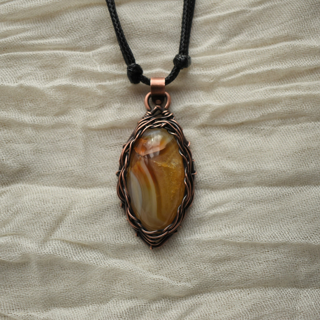 wire wrapped pendant necklace handcrafted with pure copper and Carnelian Agate