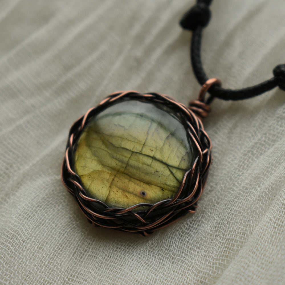 yellow labradorite pendant necklace woven with copper