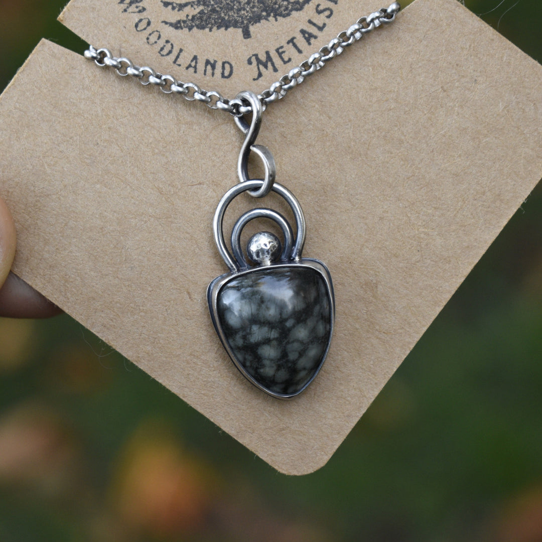 Necklace with a beach stone set in Sterling silver
