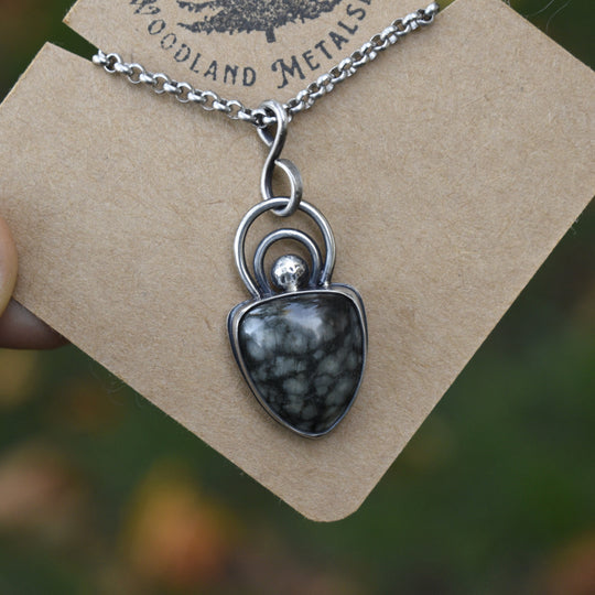 Necklace with a beach stone set in Sterling silver