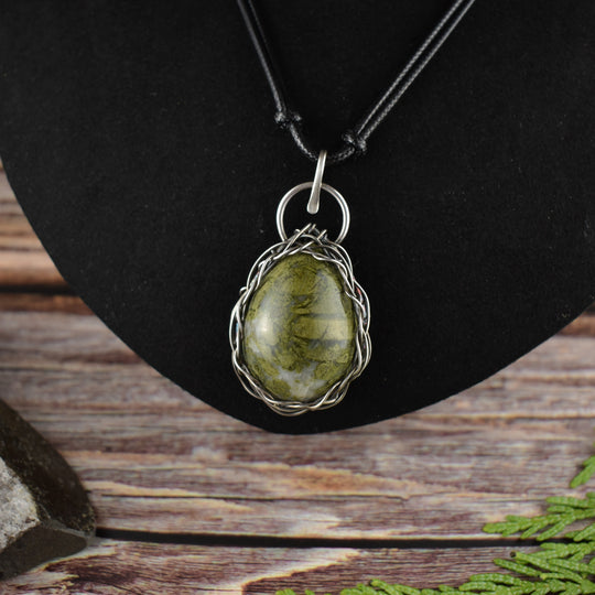 Epidote and sterling silver pendant necklace on an adjustable cord