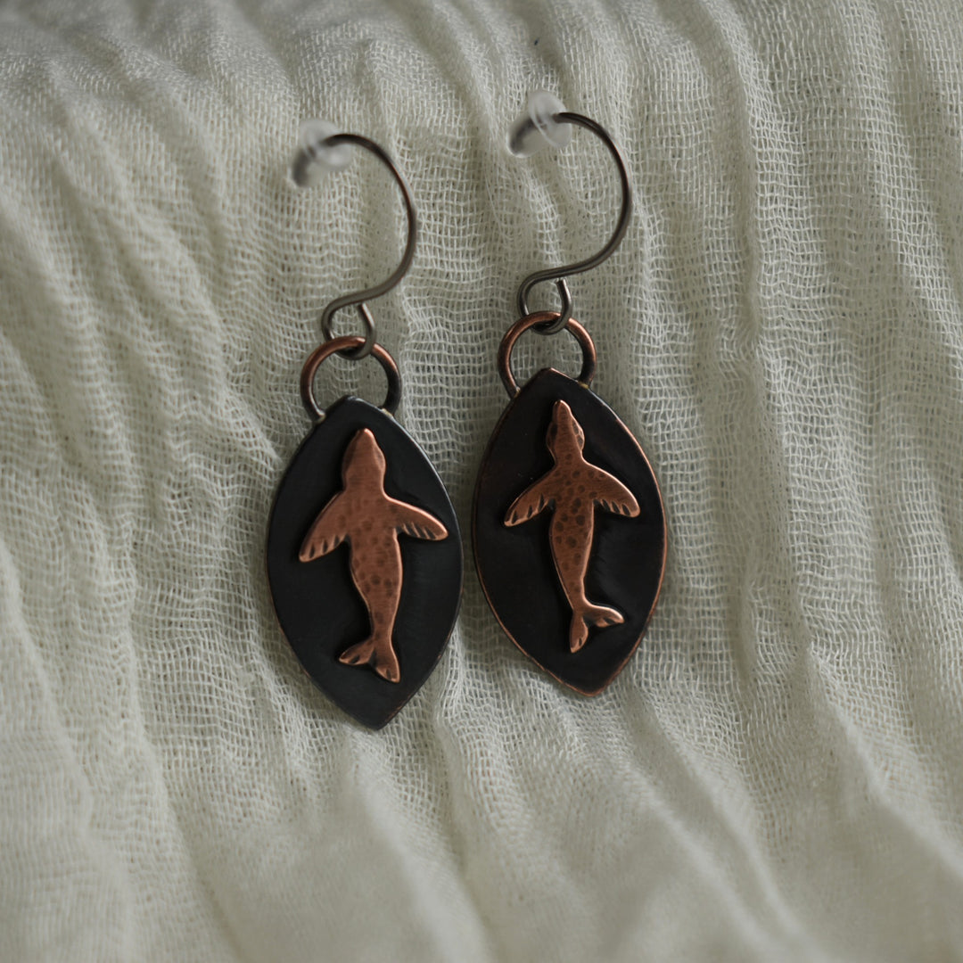 Handmade harbor seal earrings in copper with hypoallergenic hooks