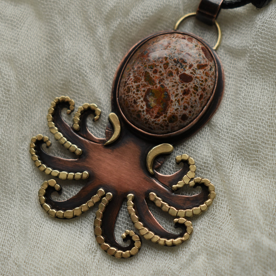 octopus mixed metal necklace in copper and brass
