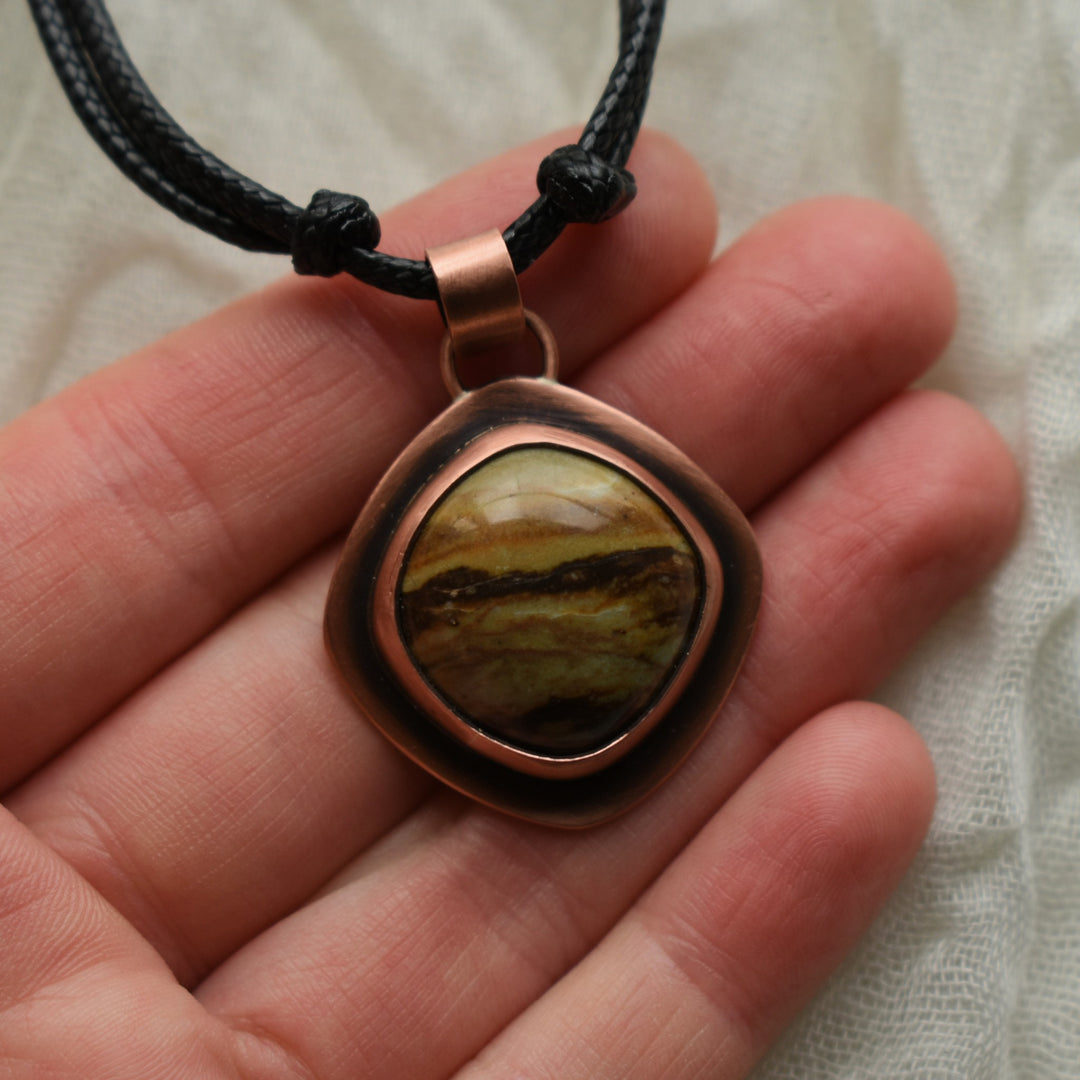 metalsmith pendant necklace handmade with picture jasper and copper