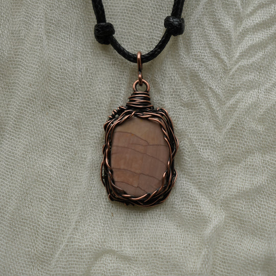 pendant necklace made with pink oregon jasper and copper