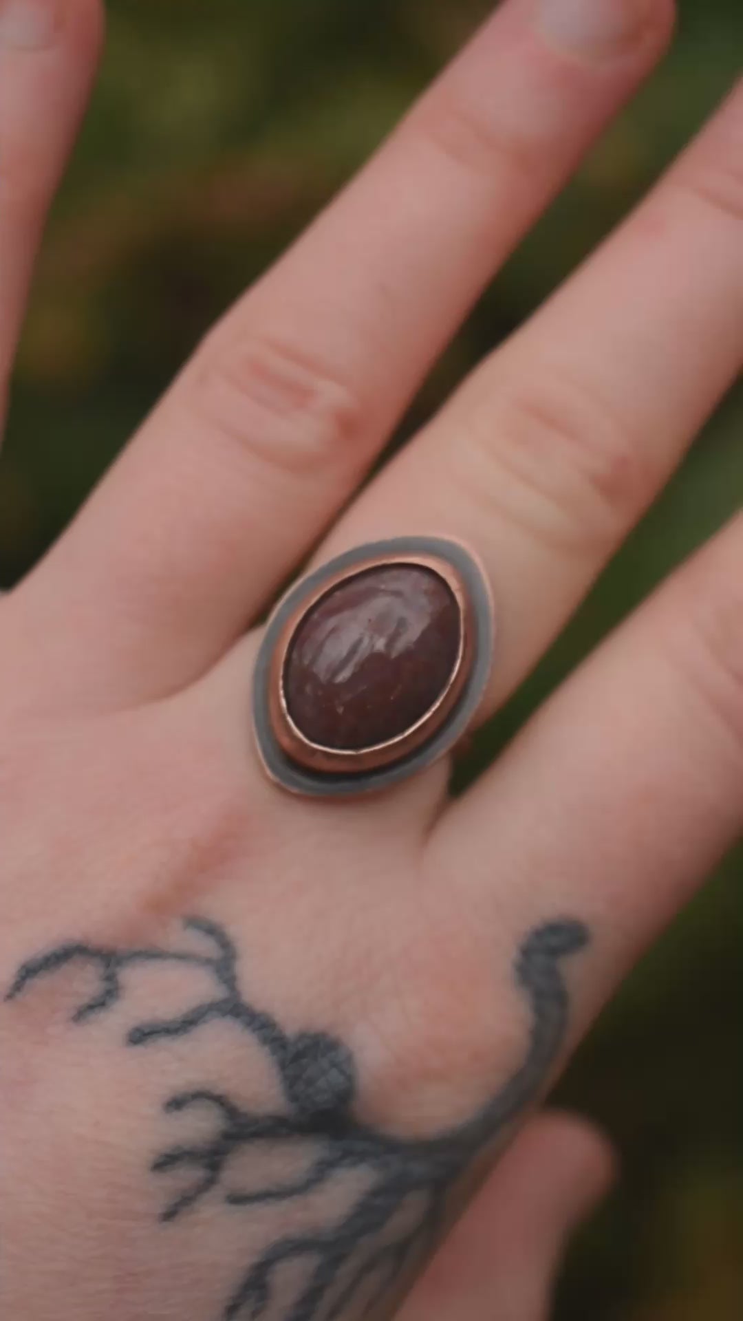 mixed metal ring handcrafted with pink jasper, copper and sterling silver.