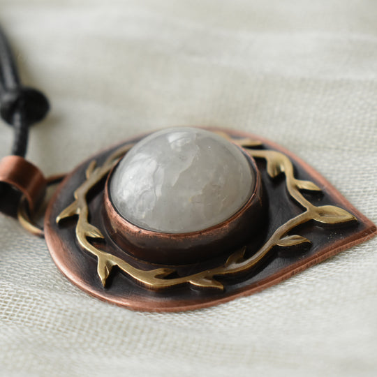 metalsmith pendant necklace made with snowy quartz gemstone