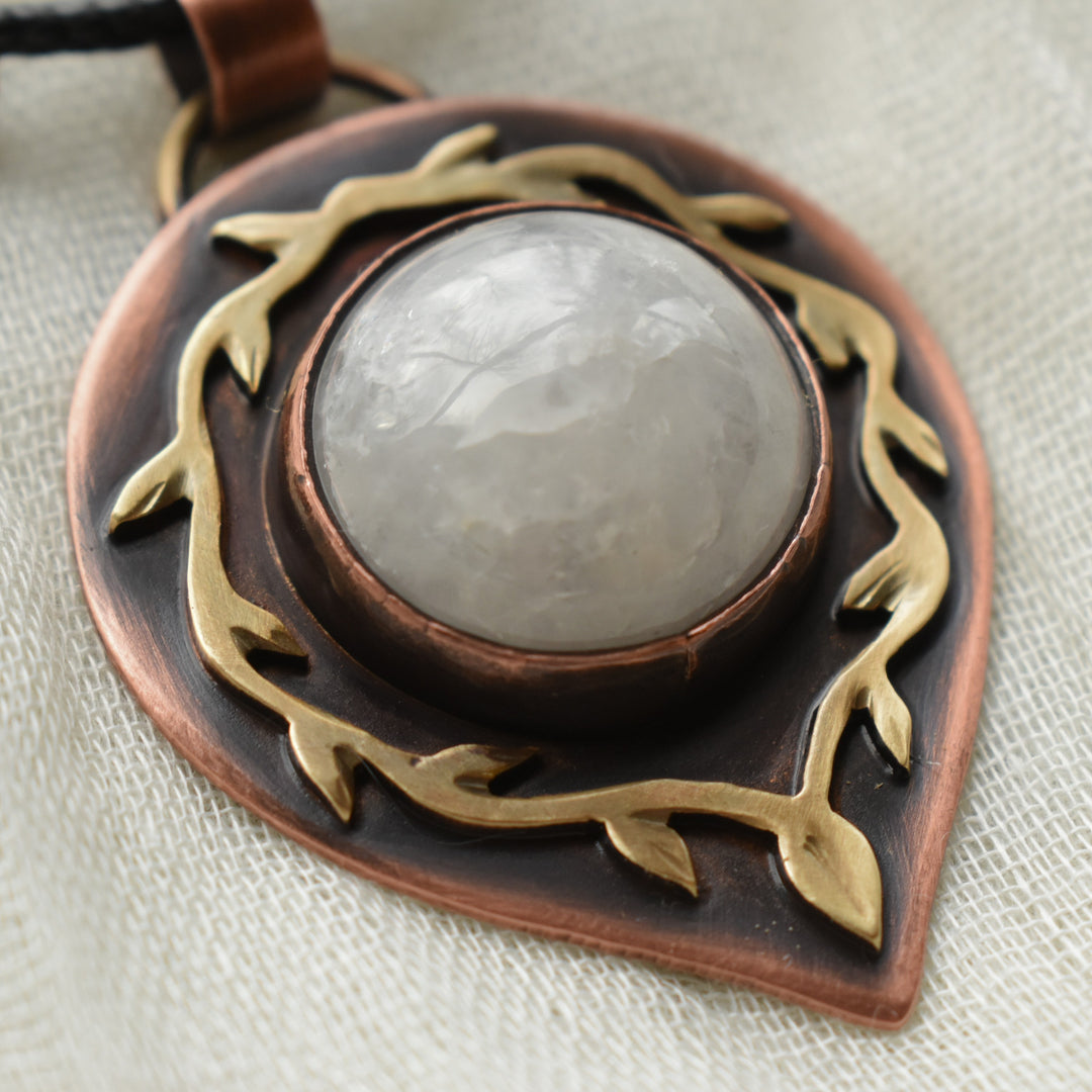 mixed metal necklace handmade with snowy quartz, copper and brass