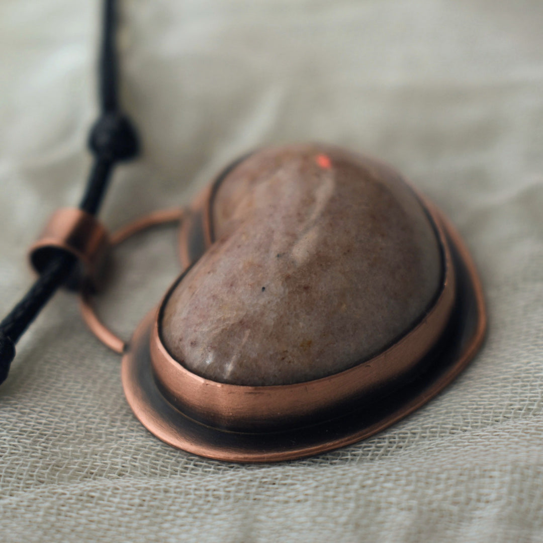 rustic pendant necklace made with pink jasper heart and pure copper