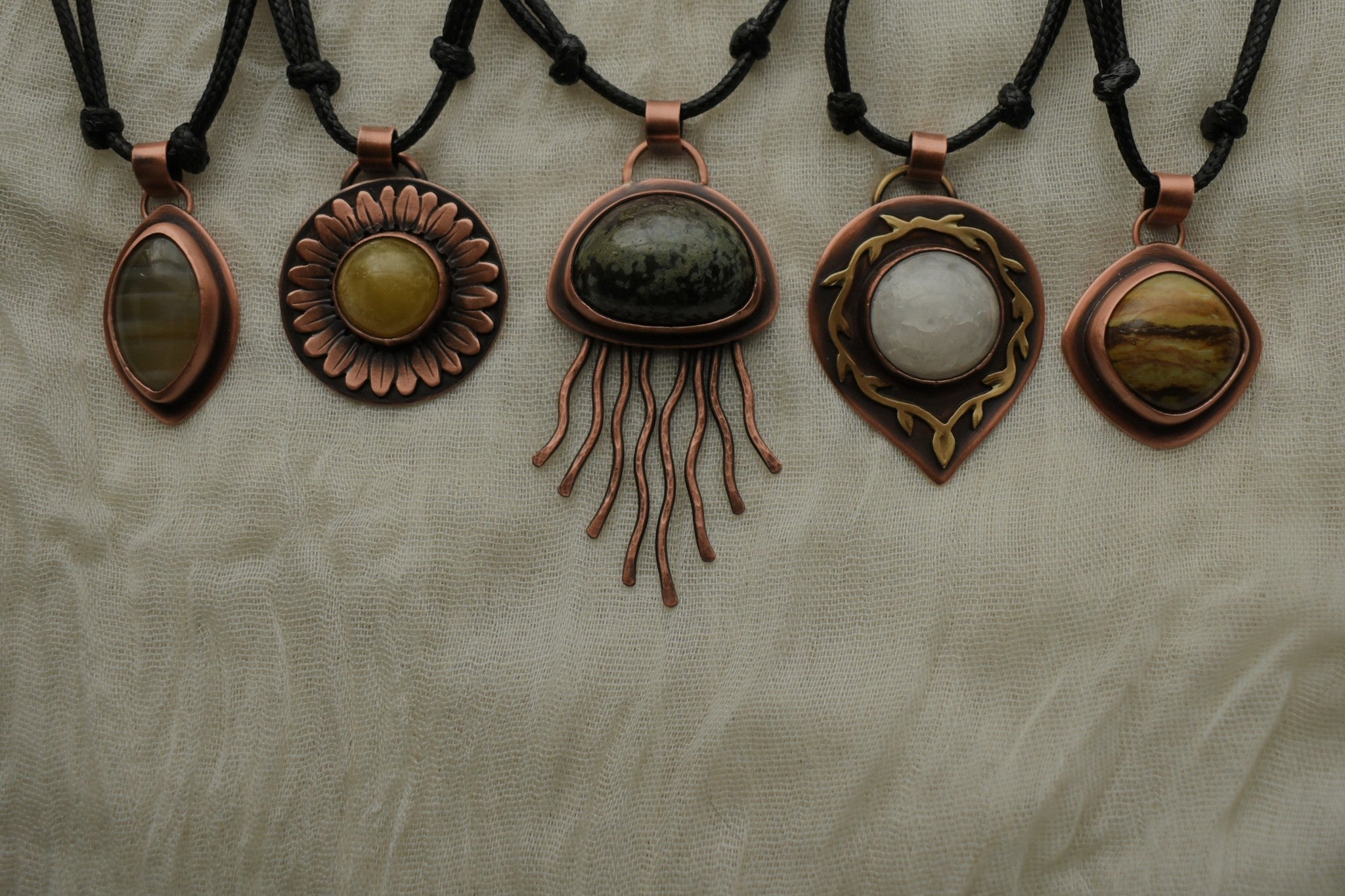 Uniquely handmade copper jewelry by Woodland Metalsmith