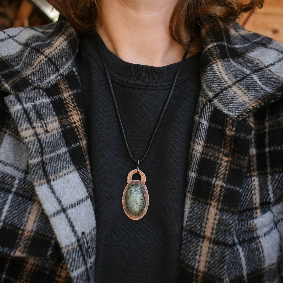 metalsmith pendant necklace made with variolite and copper