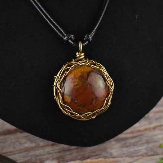 Wire Wrapped pendant necklace with Sagenite Agate and brass