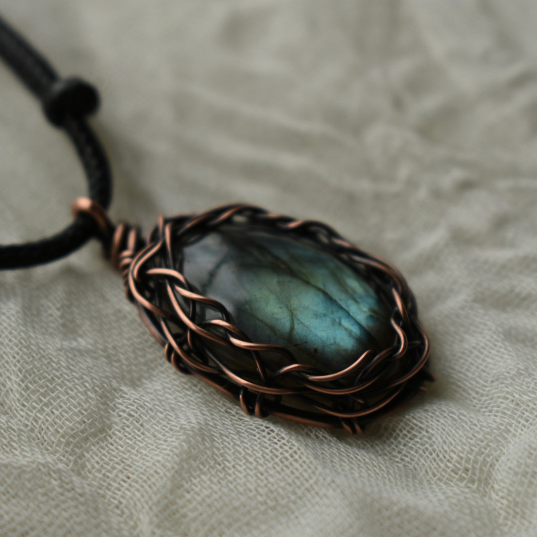 unique pendant necklace woven with labradorite and copper